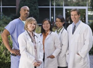 A group on doctors posing for a picture